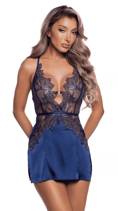 Woman wearing Astral Allure navy lace and satin chemise, front